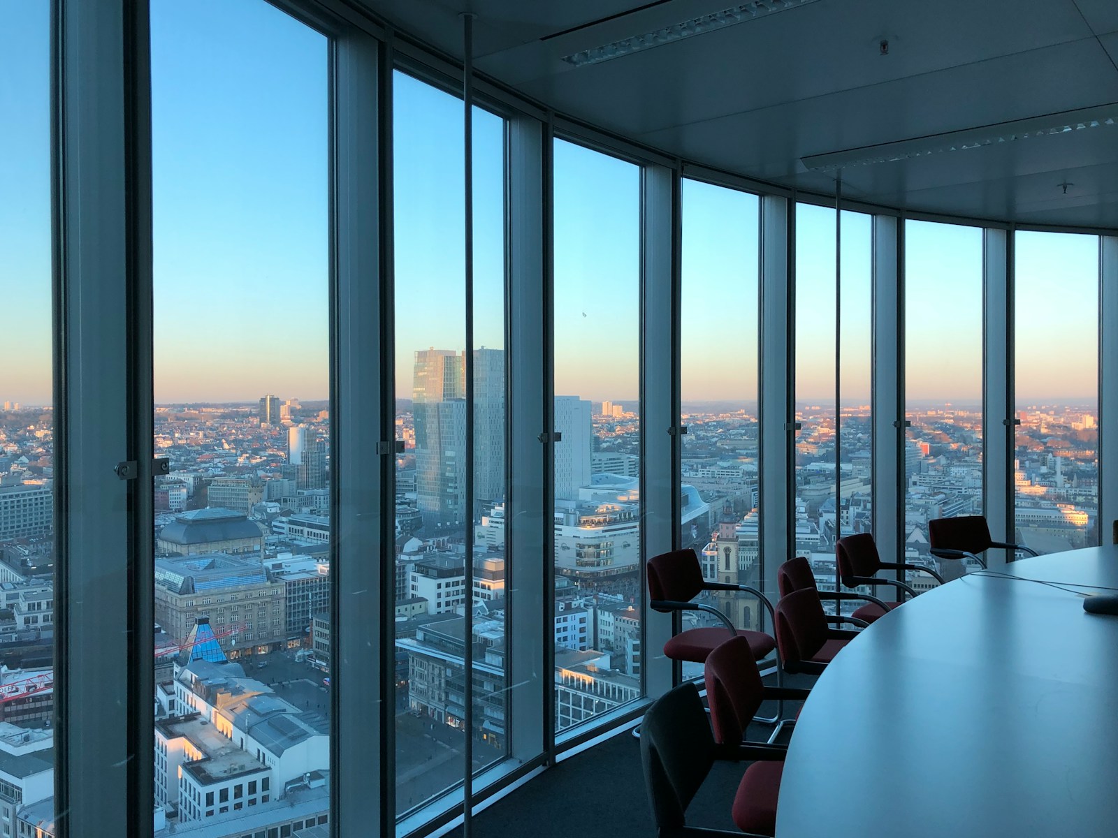 Executive boardroom with a city skyline view